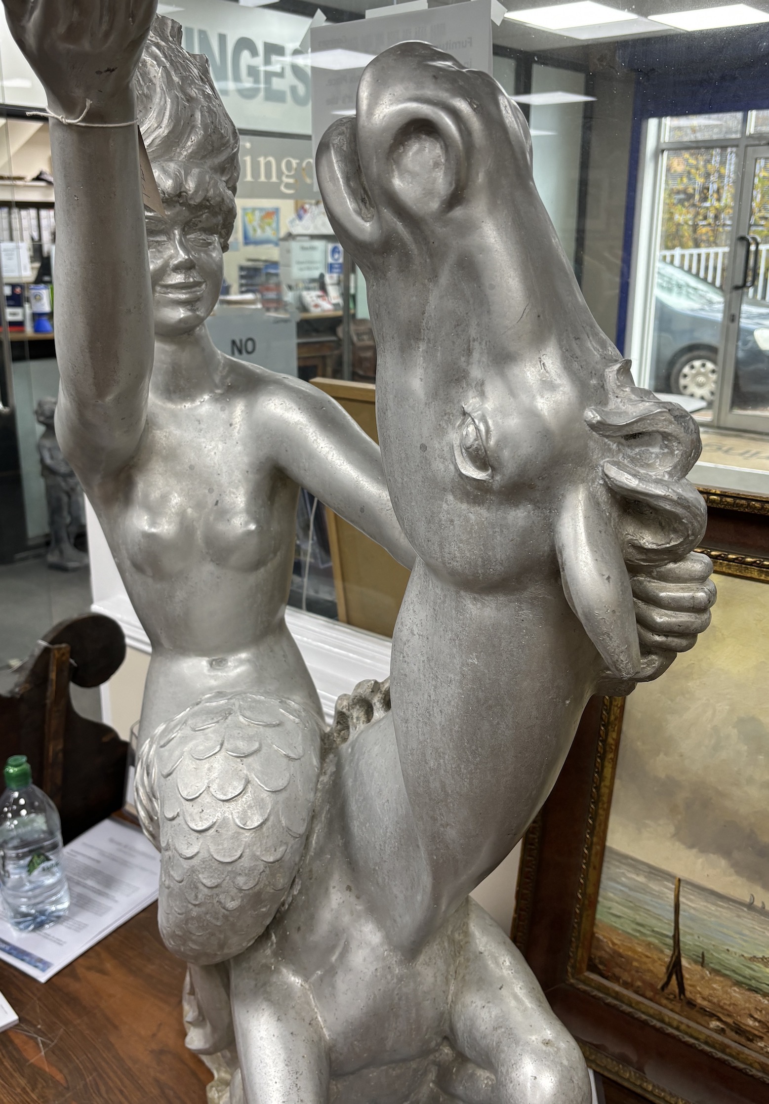 Arthur Fleischmann (1896-1990), an aluminium figure of 'Esther' astride a hippocamp, height 110cm, removed from The Shaw Savill cruise liner 'The Ocean Monarch', with original brochure and invoice